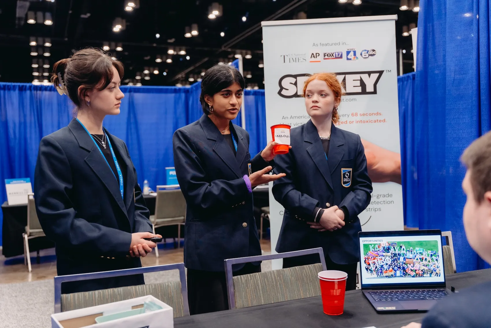 Students presenting their business and marketing plans in an entrepreneurship competitive event at DECA ICDC 2025