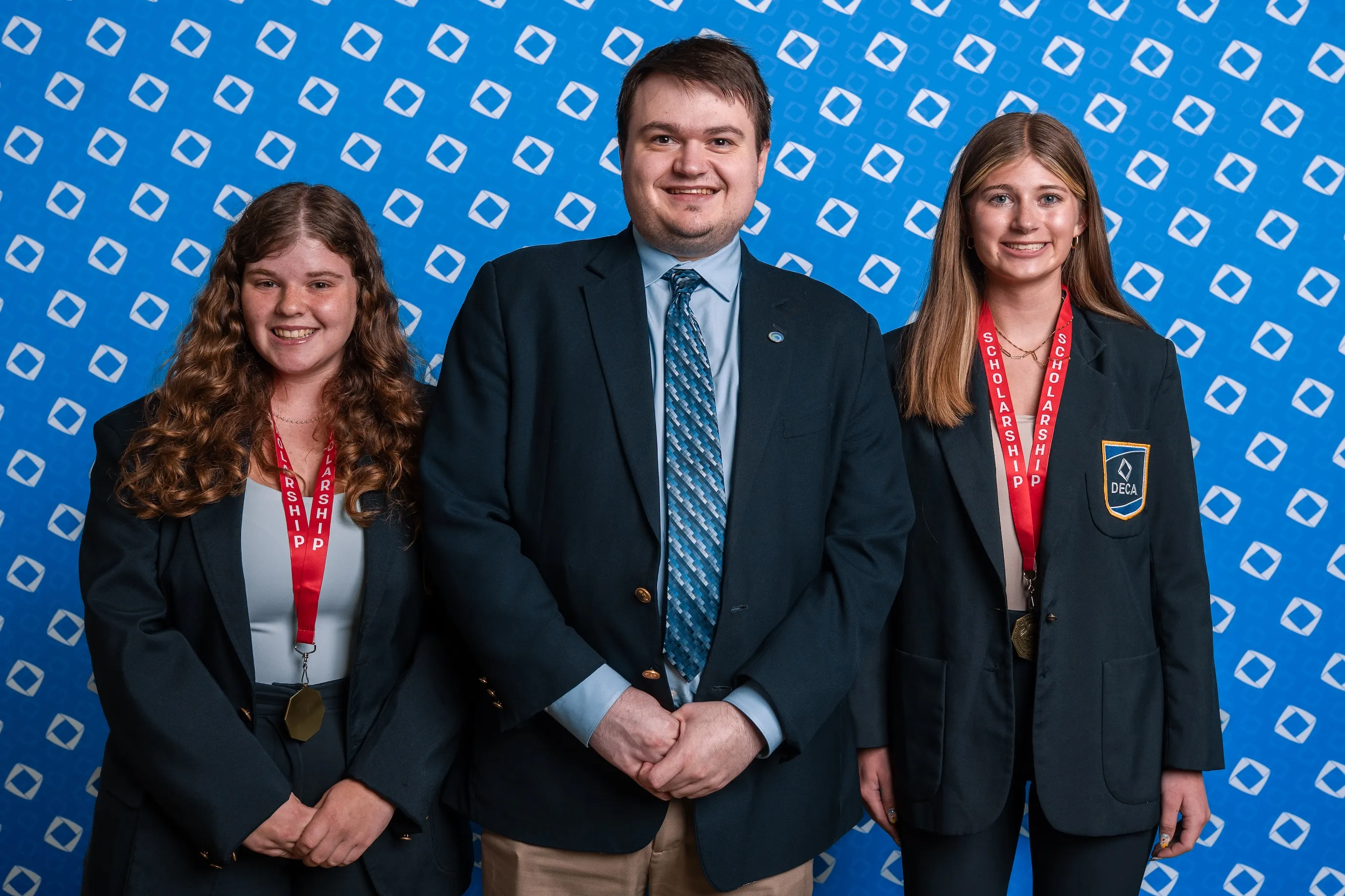 CEO Alex Mellott with the winners of the 2025 Clearpoint Business Group/DECA Scholarship