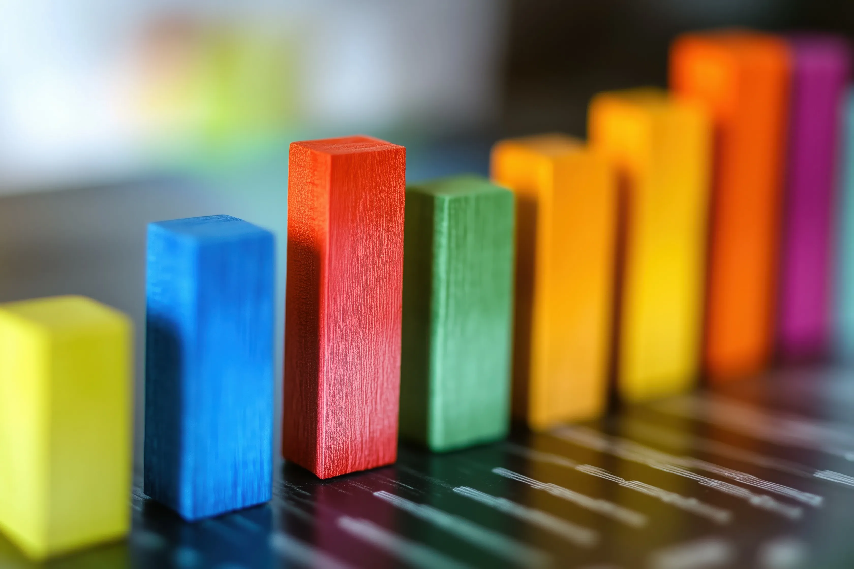 Three-dimensional bar graphs representing competitor benchmarking and performance analytics